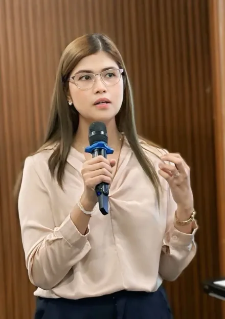 Mary Joy Competente speaking at a mental health workshop